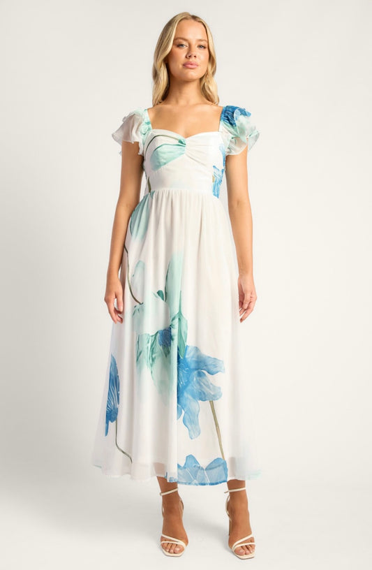Woman wearing a floral dress on a white background